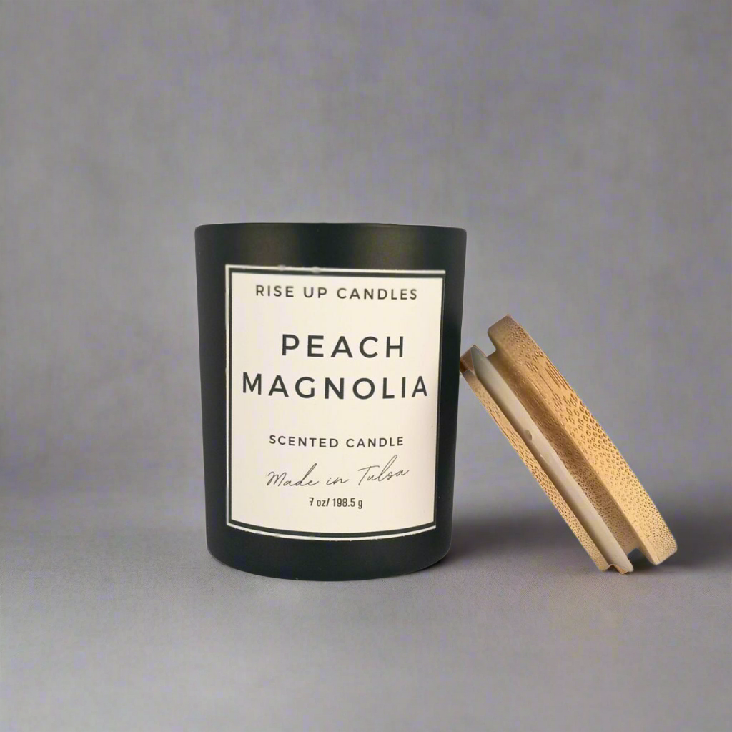 Peach magnolia scented soy candle black